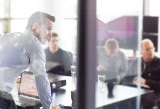 Employees working at a conference table